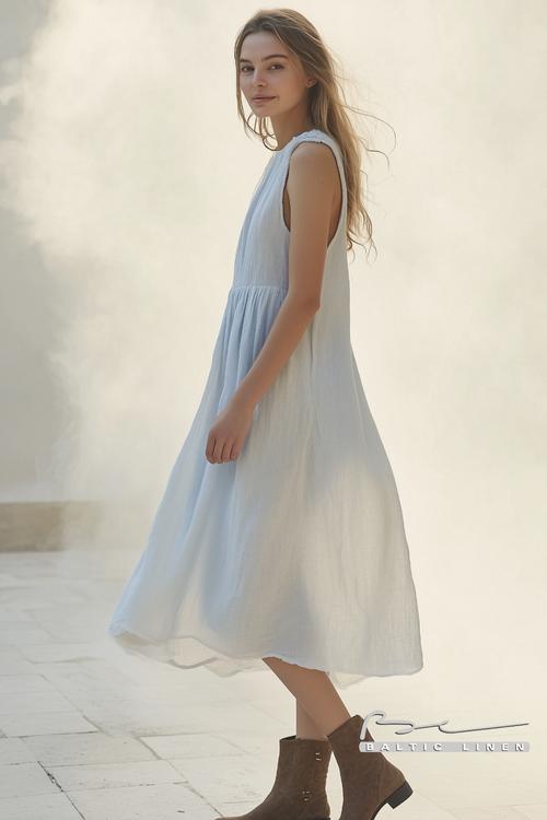 Dreamy model portrait in casual linen dress surrounded by misty Granada