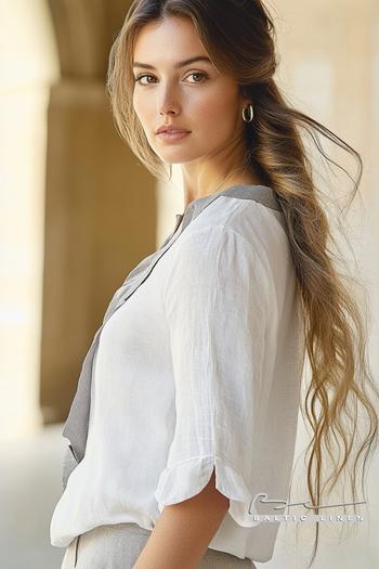 Elegant fishtail braid and linen shirt at Plaza de España in Seville