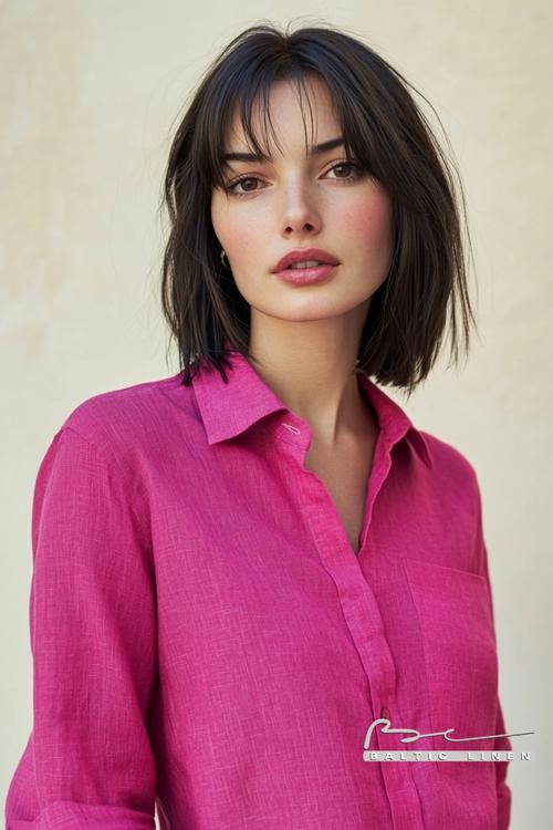 Stylish jet-black bob cut with fuchsia linen outfit inspiration