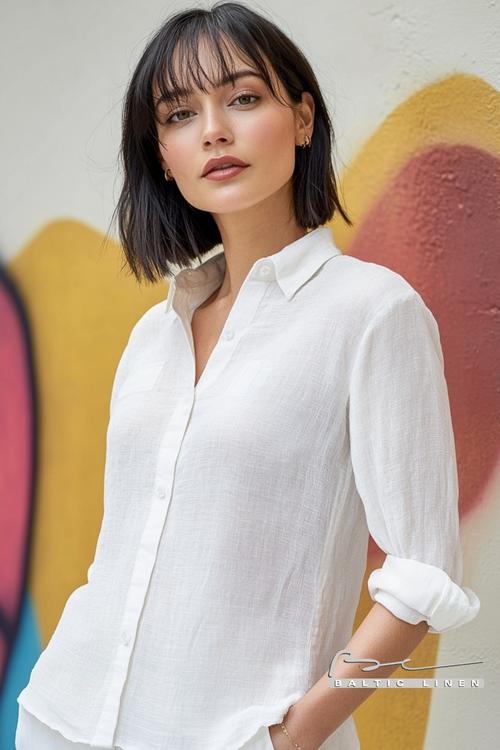 Chic street style with black bob hairstyle and white linen outfit in London