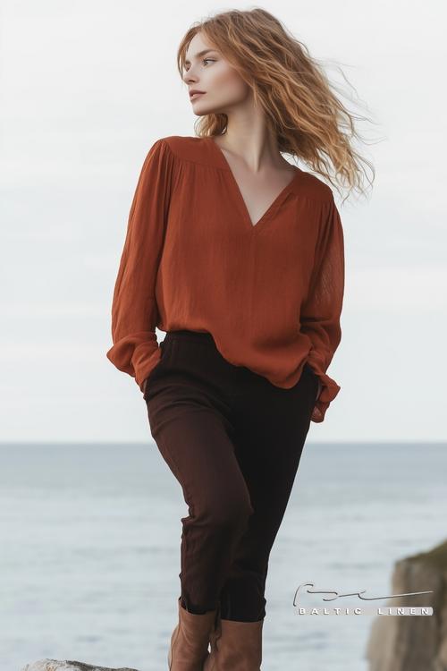 Auburn hair and rust blouse styled beautifully at Pointe du Raz