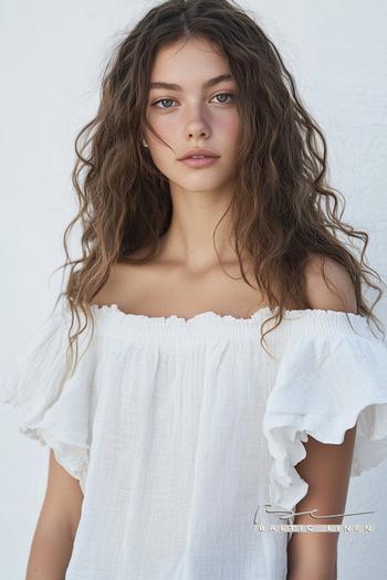 Stunning Andalusian Portraits with Curly Hair and Linen Fashion