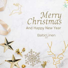 A white Christmas card from Baltic Linen, wishing you a Merry Christmas, decorated with snowflakes, Christmas tree ornaments, and golden reindeer.