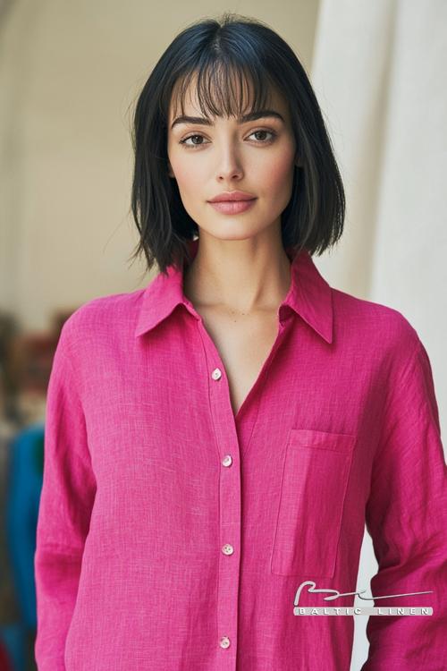Stunning woman portrait in fuchsia dress at Granada Alcaicería Market