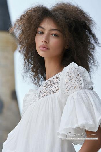 "Bold Afro Hair Inspiration with Trendy Linen Blouse Styles"