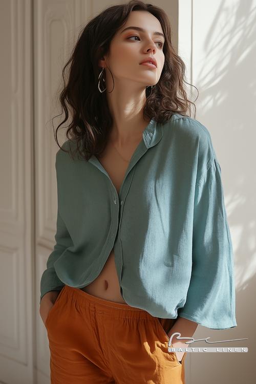 Charming summer outfit featuring a green linen shirt and suede boots.