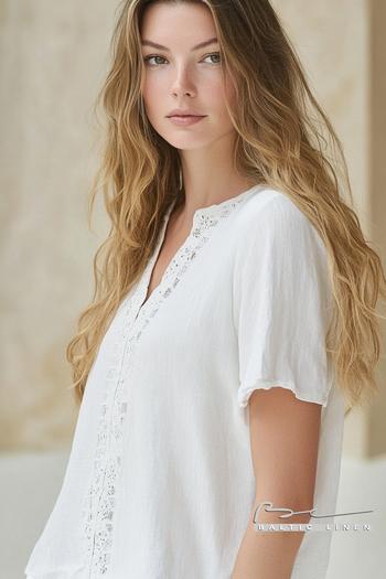 Stunning fashion photo showcasing linen elegance at Granada Cathedral