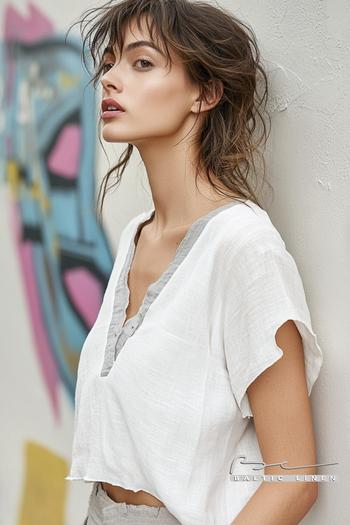 Stylish white linen blouse paired with urban vibes in Shoreditch