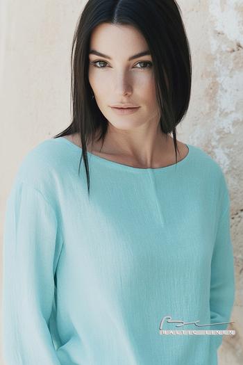 Stunning portrait of a woman with black hair in Granada skyline