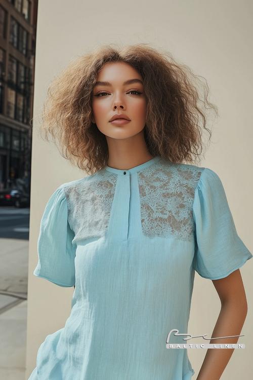 Stunning Afro hairstyle with aqua blue blouse during golden hour
