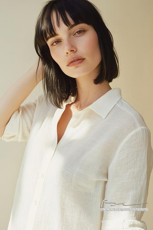 Stunning aerial shot of jet-black bob and linen in golden light