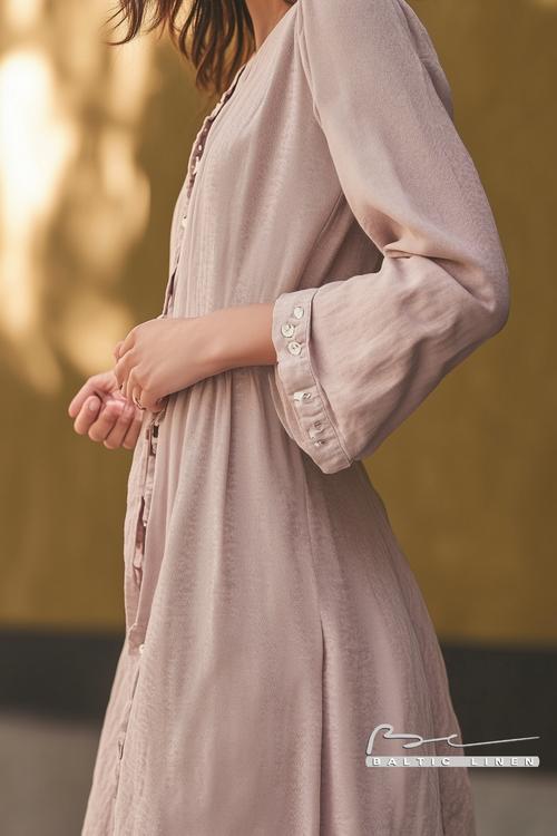 Flowing linen dress styled against the beautiful Côte de Granit Rose