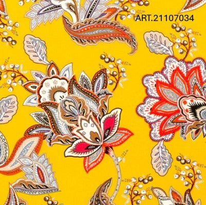 Decorative fabric pattern with floral designs on a yellow background