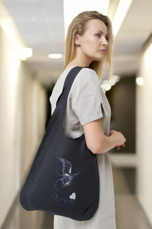 Stylish linen tote bag features one front pocket with a print from Baltic Linen