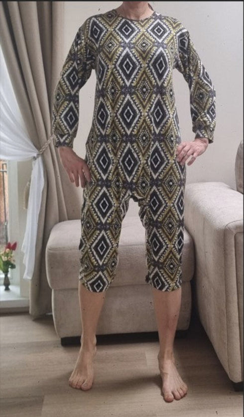 Colorful, easy-wear geriatric sleepwear for seniors, worn by an elderly woman, offering softness and convenience for daily use.