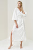 Image 1 of Wrap linen dress features an oversized fit and long sleeves Mikay from Baltic Linen