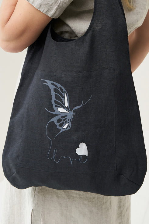 Image 4 of Stylish linen tote bag features one front pocket with a print from Baltic Linen