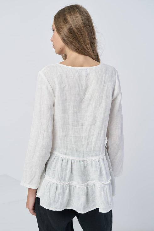 Image 6 of Casual linen blouse features a ruffled bottom and long sleeves Vaiva from Baltic Linen