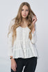 Image 1 of Casual linen blouse features a ruffled bottom and long sleeves Vaiva from Baltic Linen